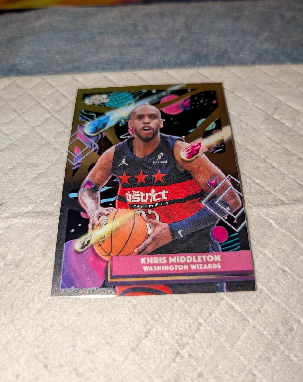 Topps Khris Middleton Card with Pink and Red Accents Holographic